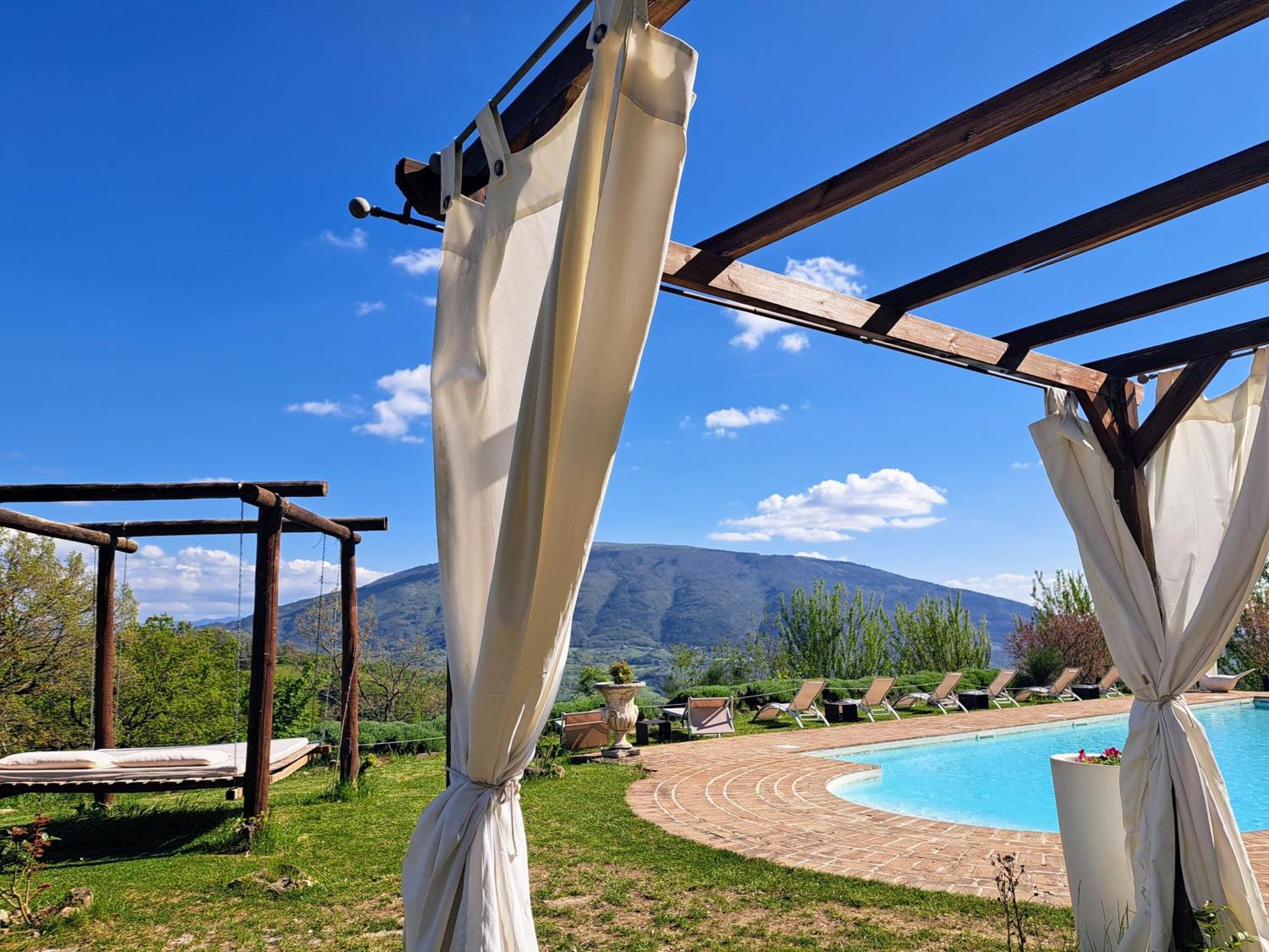 Le Ginestre Guesthouse Assisi Bagian luar foto